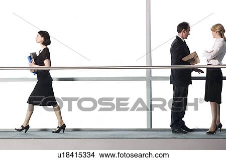 Office workers in modern office building View Large Photo Image Picture - Office workers in modern office building. Fotosearch