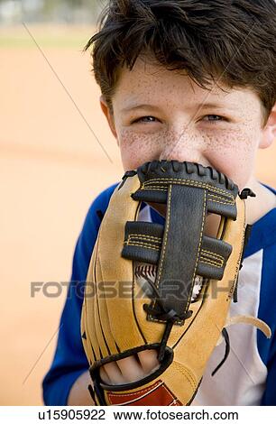 Stock Image - Portrait boy with catcher's mitt . Fotosearch