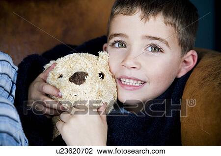 Stock Image - portrait little boy and teddy bear . Fotosearch
