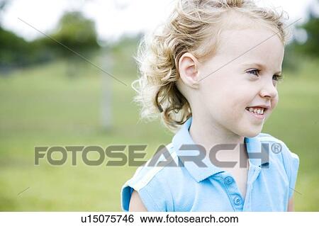 Portrait little girl from side View Large Photo Image Stock Photograph - Portrait little girl from side. Fotosearch