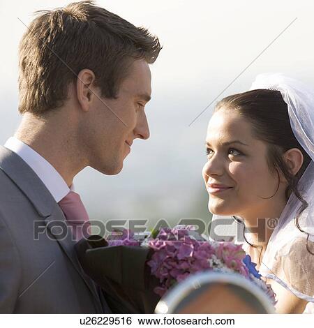 Stock Photograph - Portrait of a bride and groom. Fotosearch