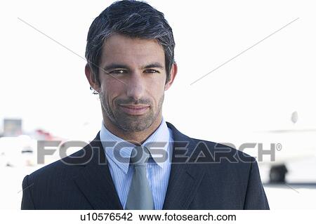 Portrait of a businessman View Large Photo Image Stock Image - Portrait of a businessman. Fotosearch