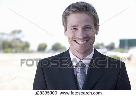 Portrait of a businessman View Large Photo Image Stock Image - Portrait of a businessman. Fotosearch