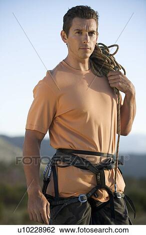 Stock Image - Portrait of a climber. Fotosearch