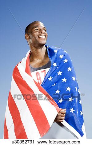 Portrait of a male athlete with US flag View Large Photo Image Stock Image - Portrait of a male athlete with US flag. Fotosearch