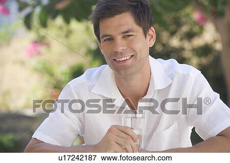 Portrait of a man relaxing View Large Photo Image Stock Photo - Portrait of a man relaxing. Fotosearch