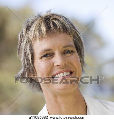 Portrait of a mature woman View Large Photo Image Stock Image - Portrait of a mature woman. Fotosearch