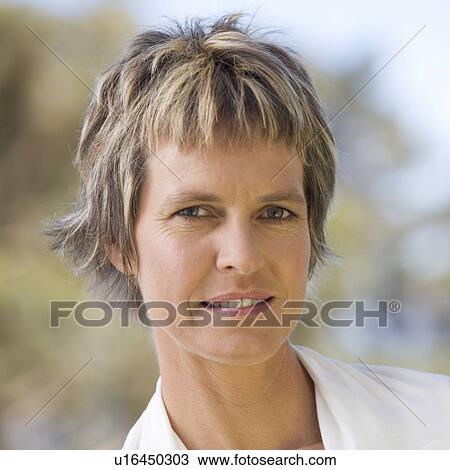 Stock Image - Portrait of a mature woman. Fotosearch