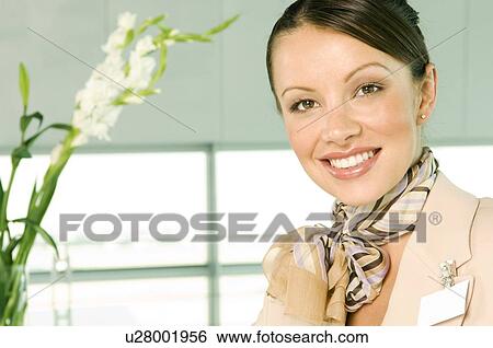 Stock Photograph - Portrait of a receptionist. Fotosearch