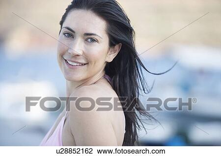 Portrait of a smiling woman View Large Photo Image Stock Image - Portrait of a smiling woman. Fotosearch
