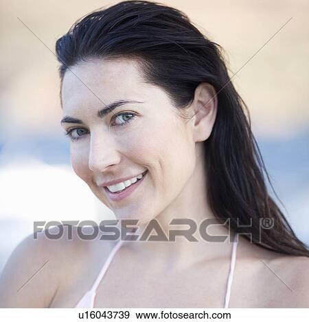 Portrait of a smiling woman View Large Photo Image Stock Photo - Portrait of a smiling woman. Fotosearch