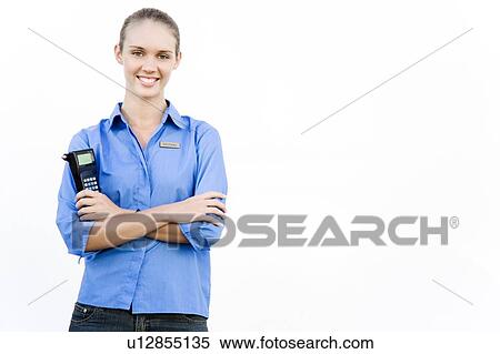 Stock Photography - Portrait of a supermarket assistant stock taking scanner. . Fotosearch