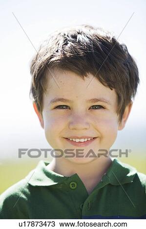 Portrait of a young boy View Large Photo Image Stock Image - Portrait of a young boy. Fotosearch