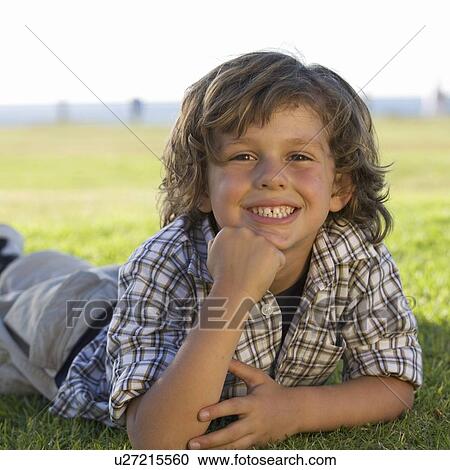 Stock Image - Portrait of a young boy. Fotosearch