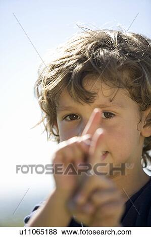 Portrait of a young boy View Large Photo Image Stock Photo - Portrait of a young boy. Fotosearch