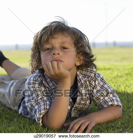 Stock Photo - Portrait of a young boy. Fotosearch