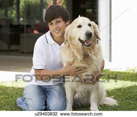 Portrait of a young boy with his pet dog View Large Photo Image Stock Image - Portrait of a young boy with his pet dog. Fotosearch