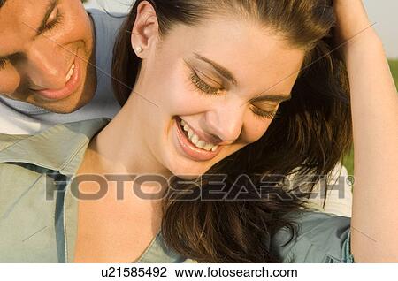 Stock Image - Portrait of a young couple. Fotosearch