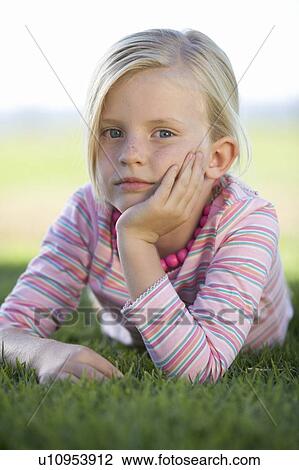 Stock Image - Portrait of a young girl. Fotosearch