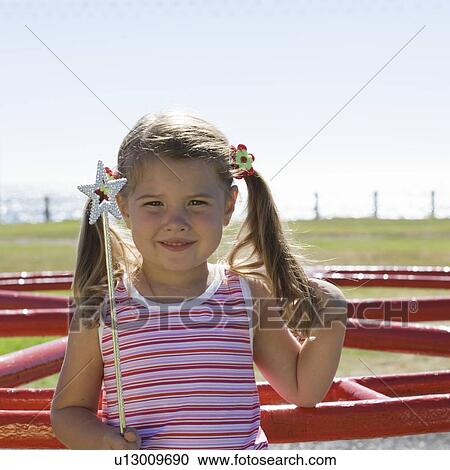 Stock Image - Portrait of a young girl. Fotosearch