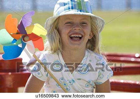 Portrait of a young girl View Large Photo Image Stock Image - Portrait of a young girl. Fotosearch