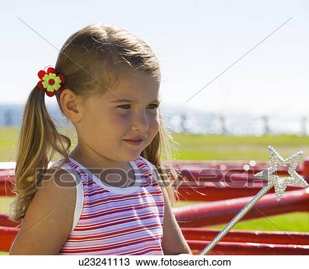 Stock Image - Portrait of a young girl. Fotosearch