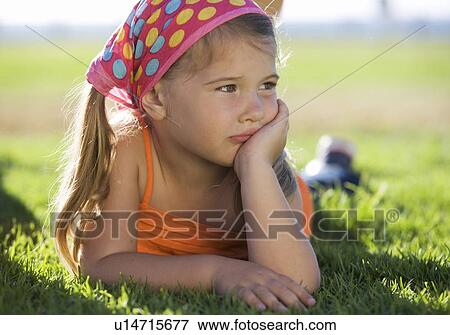 Stock Photo - Portrait of a young girl. Fotosearch