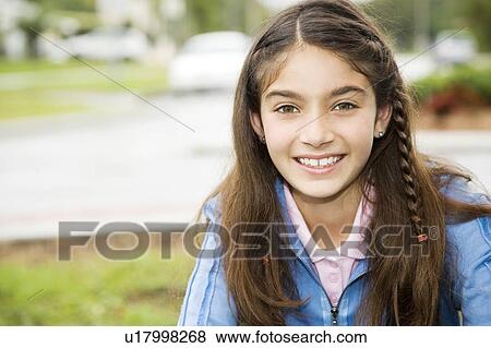 Stock Photo - Portrait of a young girl. Fotosearch
