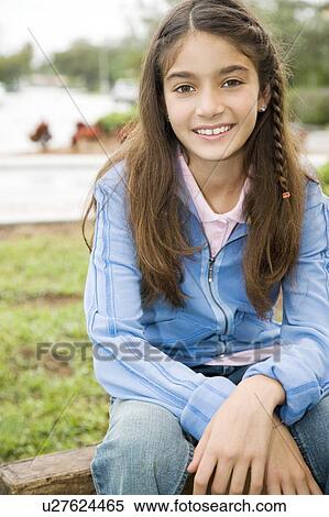 Stock Photography - Portrait of a young girl. Fotosearch