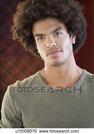 Portrait of a young man View Large Photo Image Stock Image - Portrait of a young man. Fotosearch
