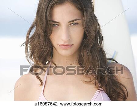 Stock Image - Portrait of a young woman. Fotosearch
