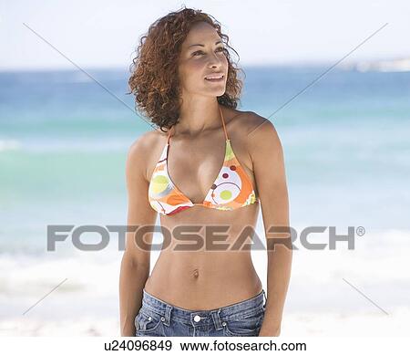Stock Photo - Portrait of a young woman. Fotosearch