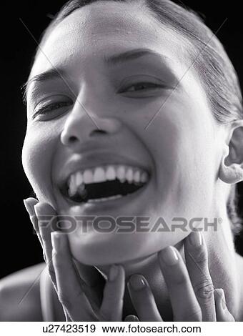 Portrait of a young woman View Large Photo Image Stock Photo - Portrait of a young woman. Fotosearch