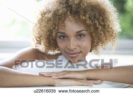 Portrait of a young woman View Large Photo Image Stock Photography - Portrait of a young woman. Fotosearch