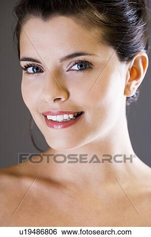 Stock Photograph - Portrait of an elegant young woman. Fotosearch
