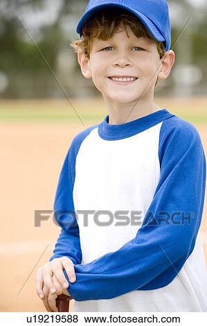 Portrait young boy on baseball pitch View Large Photo Image Stock Photo - Portrait young boy on baseball pitch. Fotosearch