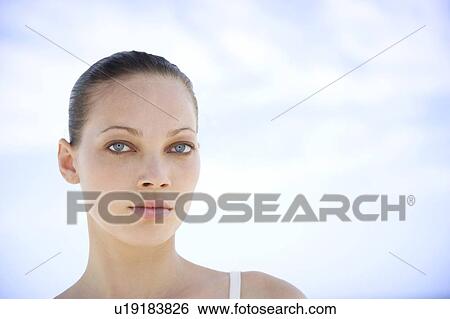 Portrait young woman's face View Large Photo Image Stock Photograph - Portrait young woman's face. Fotosearch