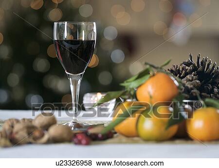 Red wine and Christmas clementines View Large Photo Image Stock Photo - Red wine and Christmas clementines. Fotosearch