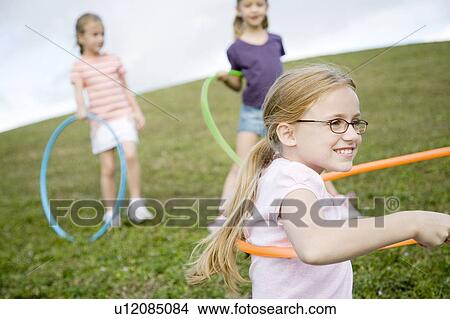 Picture - Three young girls playing. Fotosearch