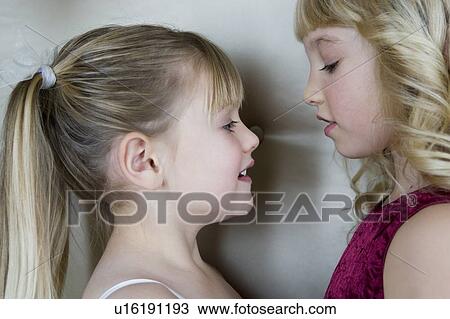 Two friends in party dresses View Large Photo Image Stock Image - Two friends in party dresses . Fotosearch