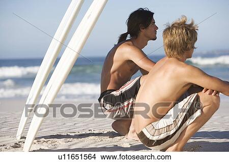 Picture - Two surfers. Fotosearch