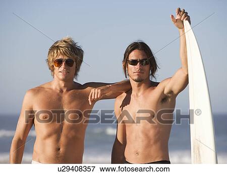 Stock Photo - Two surfers. Fotosearch