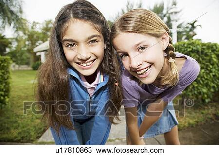 Two young friends View Large Photo Image Stock Image - Two young friends. Fotosearch