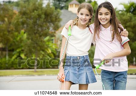Stock Photo - Two young friends. Fotosearch