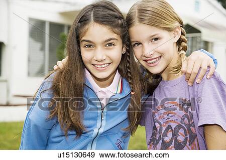 Two young friends View Large Photo Image Stock Photo - Two young friends. Fotosearch