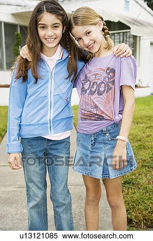 Two young friends View Large Photo Image Stock Photography - Two young friends. Fotosearch