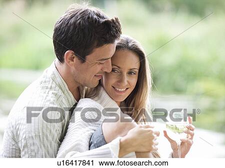 Young couple having a picnic View Large Photo Image Stock Image - Young couple having a picnic. Fotosearch