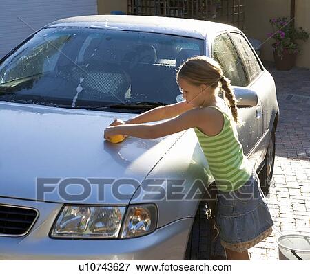 Young girl washing a car View Large Photo Image Stock Photo - Young girl washing a car. Fotosearch