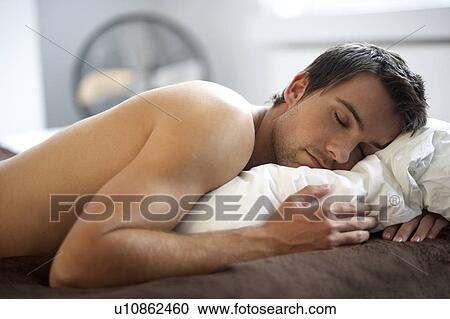 Young man sleeping View Large Photo Image Stock Image - Young man sleeping. Fotosearch