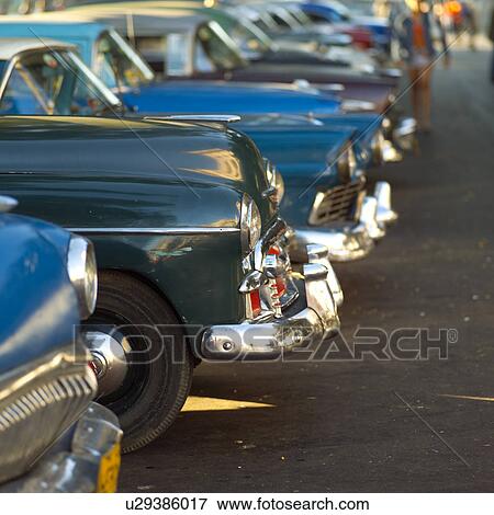 Array of antique taxi cabs parked, Havana, Cuba View Large Photo Image Stock Photo - Array of antique taxi cabs parked, Havana, Cuba. Fotosearch